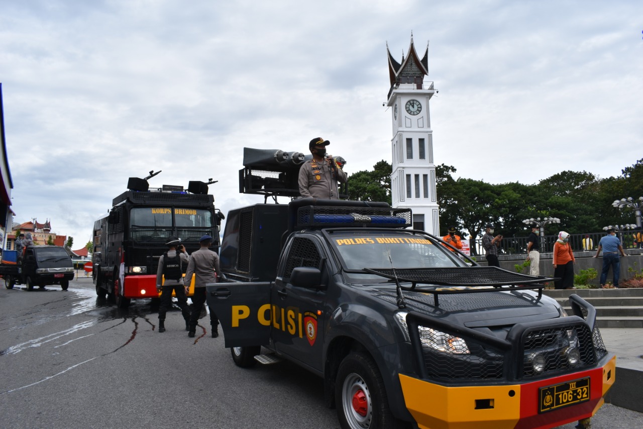 Di penghujung Ramadhan 1441 H, Polres Bukittinggi melakukan sosialisasi waspada Covid-19