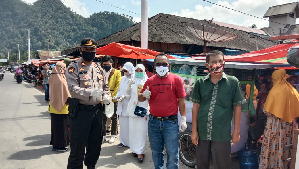 Forkopimca Gunung Tuleh bagikan masker gratis