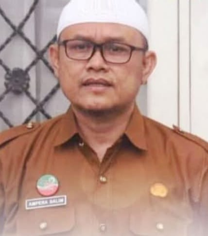 Kadis Kominfo Kota Padang Panjang, Drs Ampera Salim, SH, M.Si.