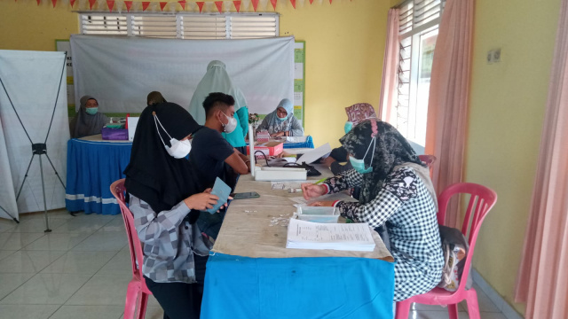 Warga Kelurahan Payolansek Kecamatan Payakumbuh Barat Kota Payakumbuh antusias untuk divaksin